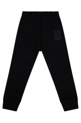 BOSS x AJBXNG Kids' cotton-blend tracksuit bottoms with exclusive logo print, Black