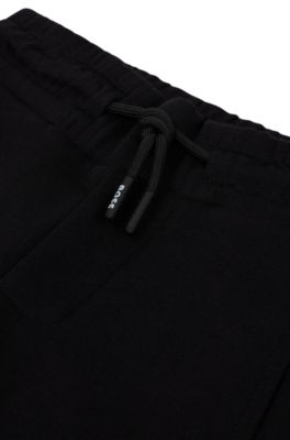 BOSS x AJBXNG Kids' cotton-blend tracksuit bottoms with exclusive logo print, Black