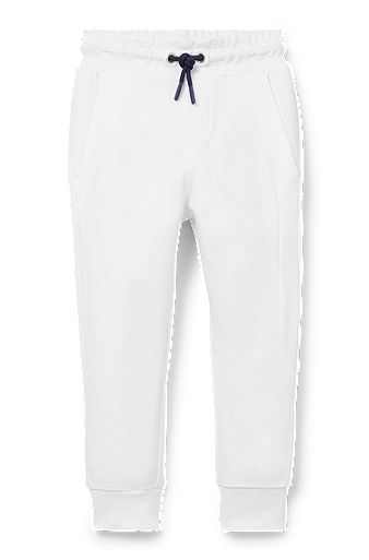 Kids' cuffed tracksuit bottoms with rear logo badge, White