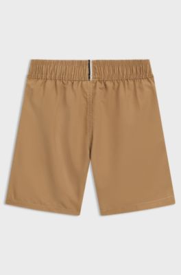 Kids' swim shorts in peached fabric with contrast logo, Brown