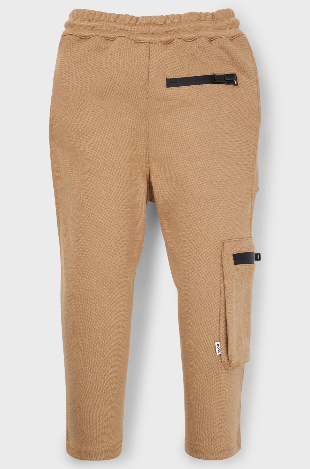 Kids' tracksuit bottoms in stretch piqué with patch pocket, Brown