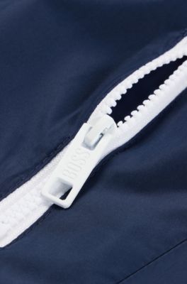 Giacca a vento per bambini idrorepellente con cappuccio e logo stampato, Blu scuro