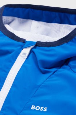 Kids' water-repellent hooded windbreaker jacket with printed logo, Blue