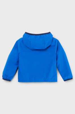 Kids' water-repellent hooded windbreaker jacket with printed logo, Blue