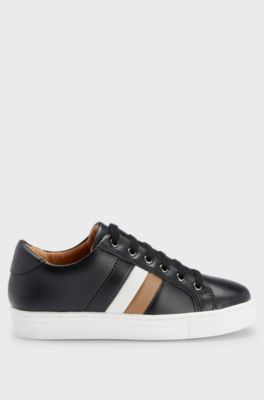 Kids' lace-up trainers in leather with signature stripe, Black