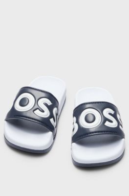 Kids' colour-blocked slides with contrast logo, Dark Blue