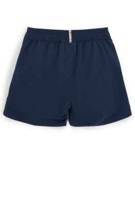 Kids' quick-dry swim shorts with vertical logo, Dark Blue
