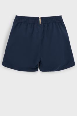 Kids' quick-dry swim shorts with vertical logo, Dark Blue