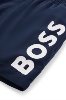 Kids' quick-dry swim shorts with vertical logo, Dark Blue