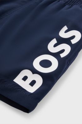 Kids' quick-dry swim shorts with vertical logo, Dark Blue