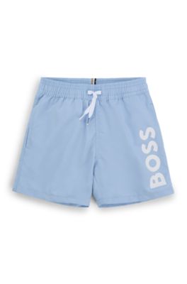 Kids' quick-dry swim shorts with vertical logo, Light Blue