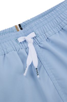 Kids' quick-dry swim shorts with vertical logo, Light Blue