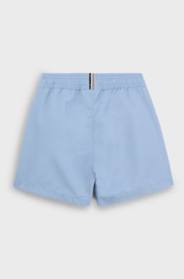 Kids' quick-dry swim shorts with vertical logo, Light Blue