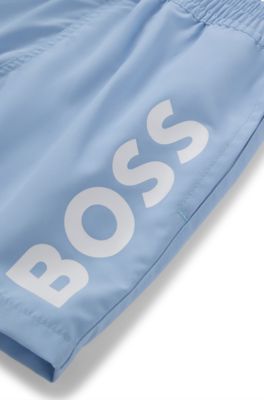 Kids' quick-dry swim shorts with vertical logo, Light Blue