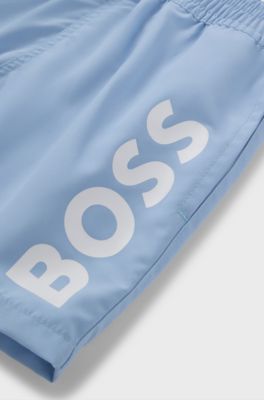 Kids' quick-dry swim shorts with vertical logo, Light Blue