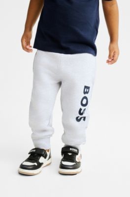 Pantalones de ch&aacute;ndal para ni&ntilde;os en forro polar con logo vertical estampado, Gris claro