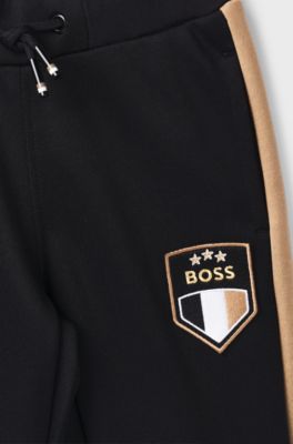 Kids' fleece tracksuit with signature colour-blocking, Black