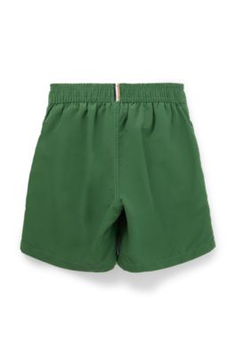 Kids' quick-dry swim shorts with vertical logo, Dark Green