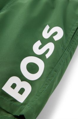 Kids' quick-dry swim shorts with vertical logo, Dark Green