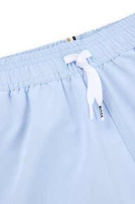 Kids' quick-dry swim shorts with vertical logo, Light Blue