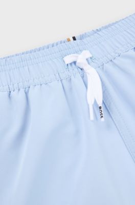 Kids' quick-dry swim shorts with vertical logo, Light Blue
