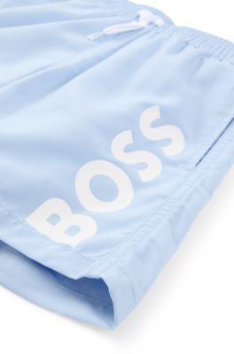 Kids' quick-dry swim shorts with vertical logo, Light Blue
