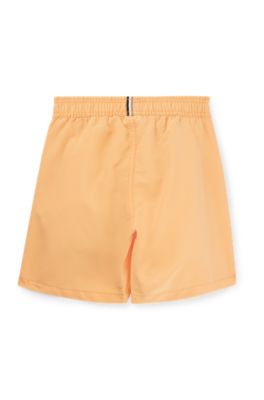 Kids' quick-dry swim shorts with vertical logo, Orange