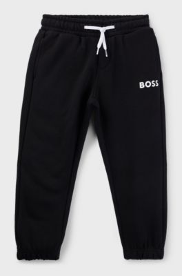Kids' fleece tracksuit bottoms with logo print, Black