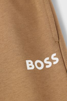 Kids' fleece tracksuit bottoms with logo print, Brown