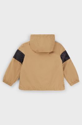 Kids' water-repellent hooded windbreaker with monogram detailing, Brown