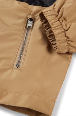 Kids' water-repellent hooded windbreaker with monogram detailing, Brown