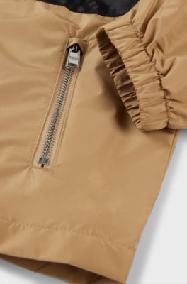 Kids' water-repellent hooded windbreaker with monogram detailing, Brown