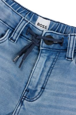 Barnshorts i stretchig denim med dragsko i midjan, M&ouml;nster