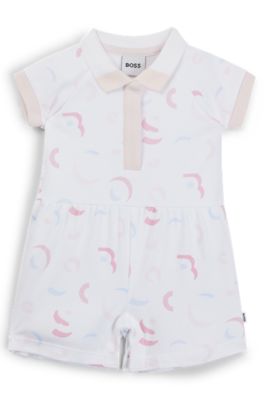 Baby playsuit in interlock cotton with printed logo pattern, Patterned