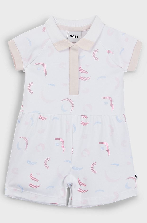Baby playsuit in interlock cotton with printed logo pattern, Patterned