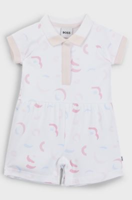 Baby playsuit in interlock cotton with printed logo pattern, Patterned