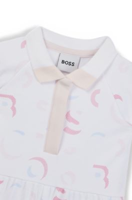 Baby playsuit in interlock cotton with printed logo pattern, Patterned