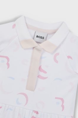 Baby playsuit in interlock cotton with printed logo pattern, Patterned