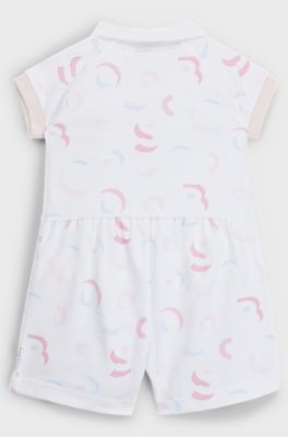 Baby playsuit in interlock cotton with printed logo pattern, Patterned