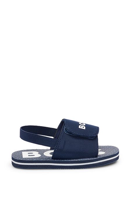 Kids' slides with ankle strap and branding, Dark Blue