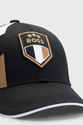 Kids' cap with colour-blocking and embroidered logo badge, Black