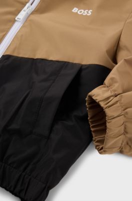 Kids' hooded windbreaker in waterproof fabric with logo print, Brown