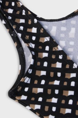 Costume da bagno scollato dietro per bambine con monogrammi all-over, Nero