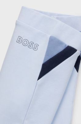 Baby tracksuit in stretch cotton with logo prints, Light Blue