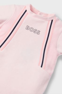 Baby sleepsuit in cotton-blend velvet with logo print, light pink