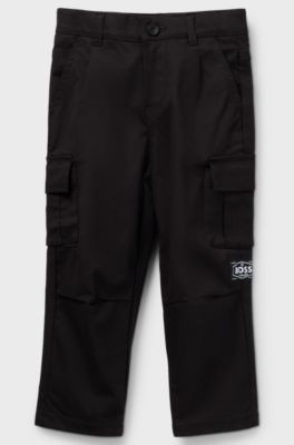Pantaloni per bambini con fit affusolato in twill di cotone elasticizzato, Nero