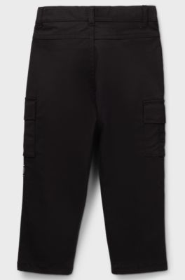 Pantaloni per bambini con fit affusolato in twill di cotone elasticizzato, Nero