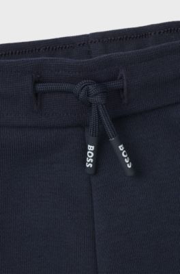 Tracksuit til b&oslash;rn med logoprint og colour blocking, M&oslash;rkebl&aring;