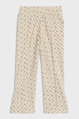 Kids-Jogginghose mit Monogramm-Print und Rei&szlig;verschl&uuml;ssen am Saum, Hellbeige