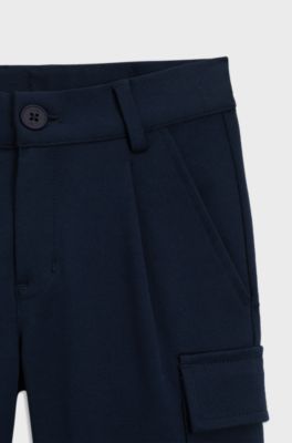 Pantaloni cargo con fit comodo per bambini realizzati in tessuto piqu&eacute; elasticizzato, Blu scuro